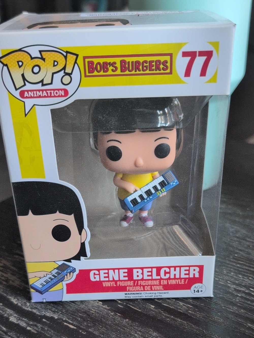 Funko Gene Belcher Pop! Vinyl with Yellow Shirt and Blue Keyboard